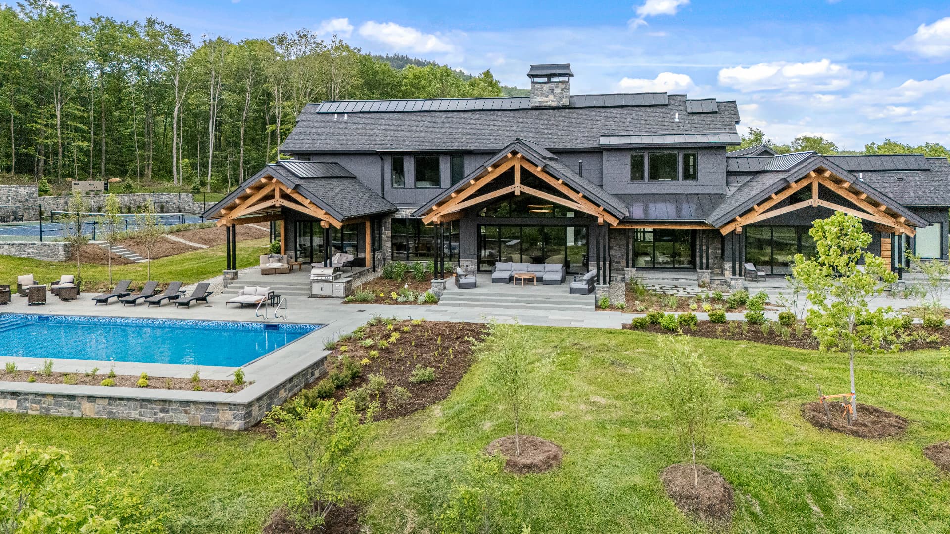 Aerial view of a freshly painted luxury home exterior by Paula Mira Painting